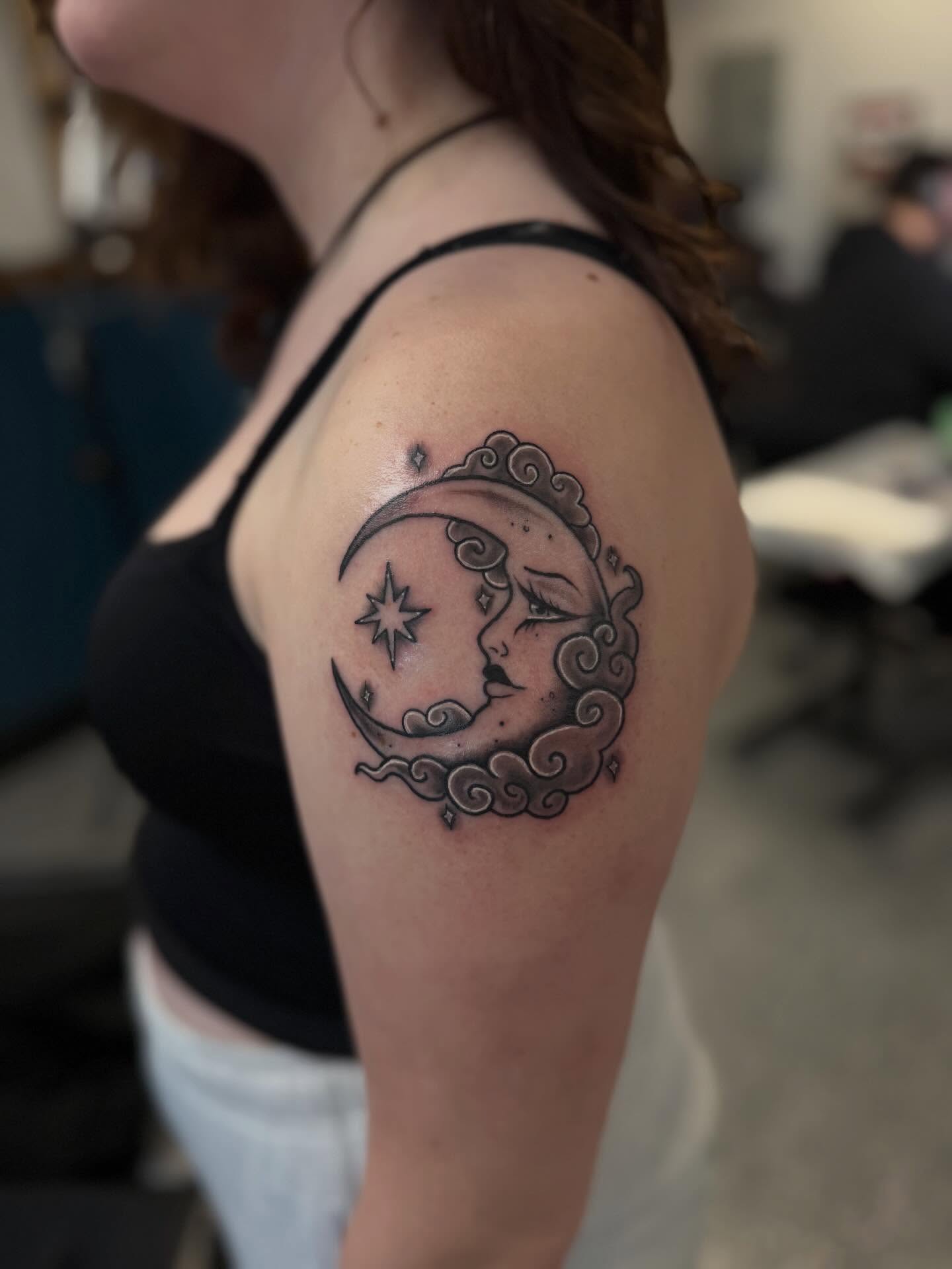 Moon and sun black and grey tattoo on the shoulder by “tatsbysabby”
