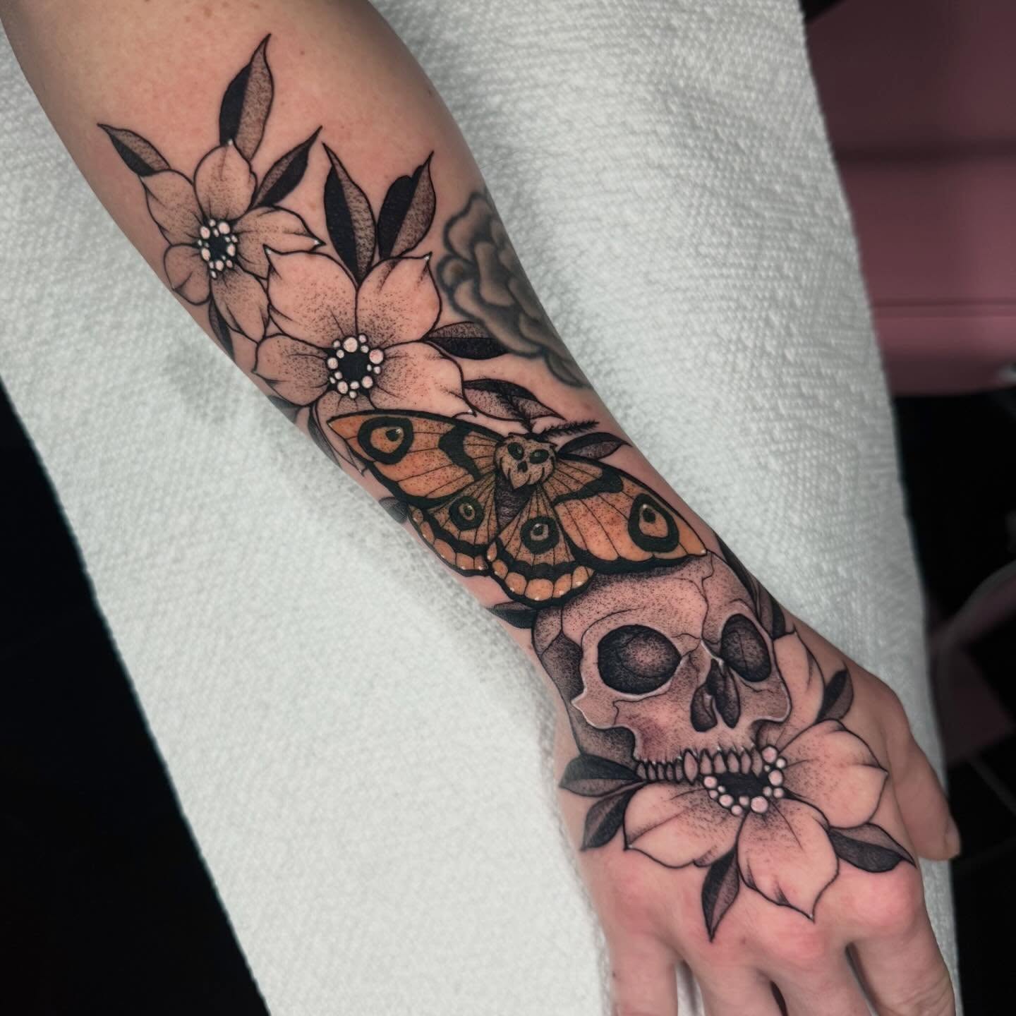 Skull and moth dotwork tattoo on the forearm by πΈπππππππ πΈππππππππ, Bel Air, Maryland