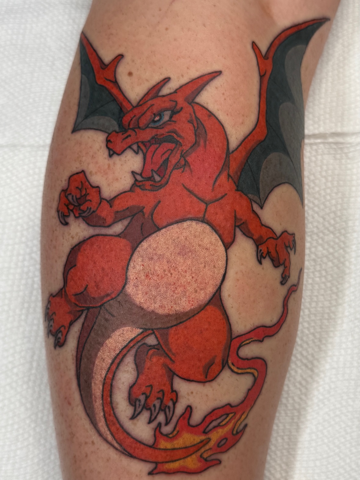 Dragon American traditional tattoo on the forearm by Christopher  Cousins, Nashville, Tennessee