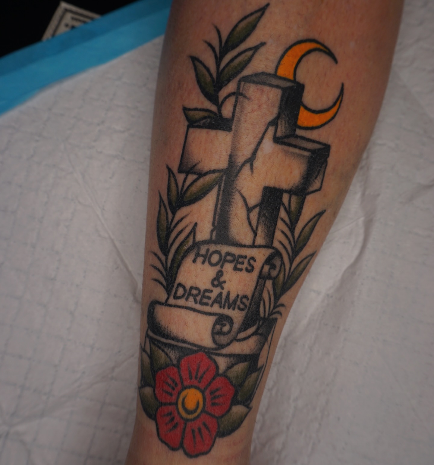 Cross with 'hopes & dreams' American traditional tattoo on the forearm by Sarah Christine Tattoo, Calgary, Alberta