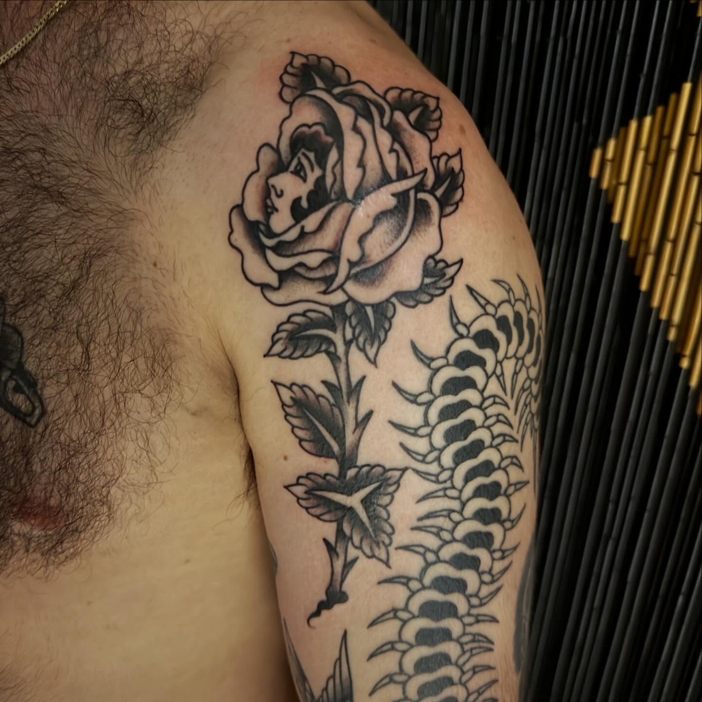 Rose and snake American traditional tattoo on the shoulder by Kane L, Albuquerque, New Mexico