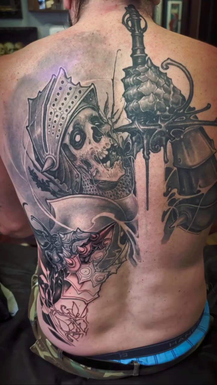 Tattoo by @raptorlazer — dark_realism, black_and_grey