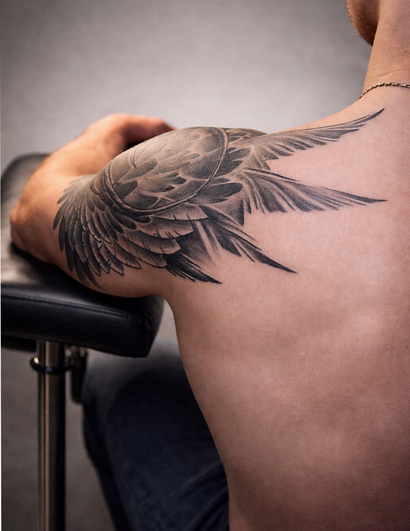 Wing black and grey tattoo on the shoulder by Sacramento tattoo