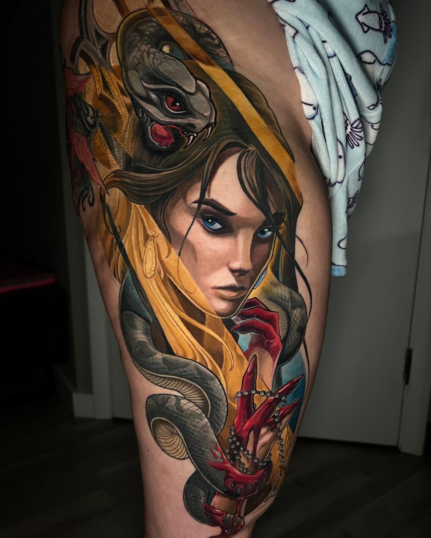 Woman with snake realism tattoo on the forearm by Zoe "Z" Fisk
