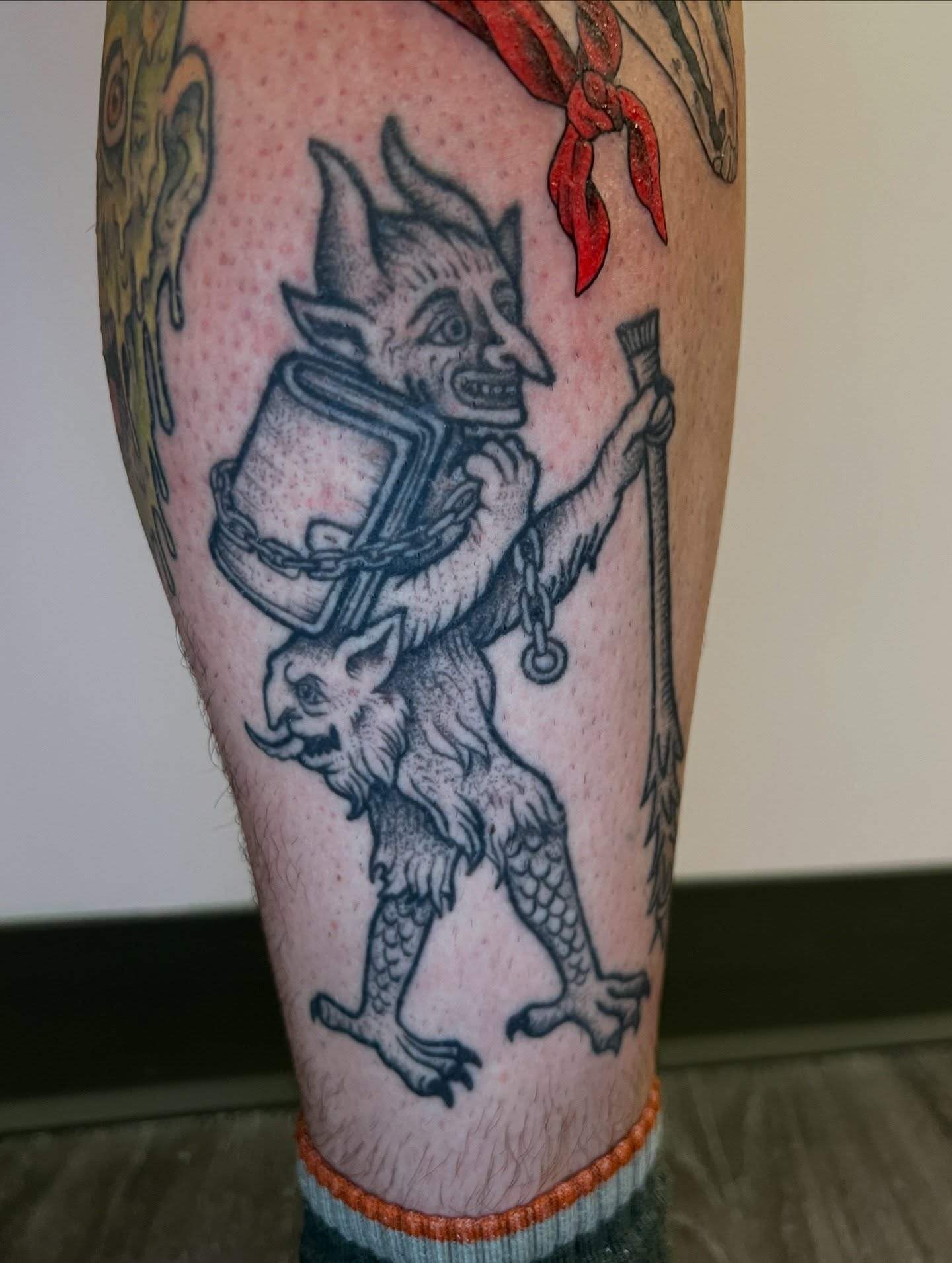 Demons dotwork tattoo on the calf by Tattoos by Shashonna - Portland Tattoo Artist