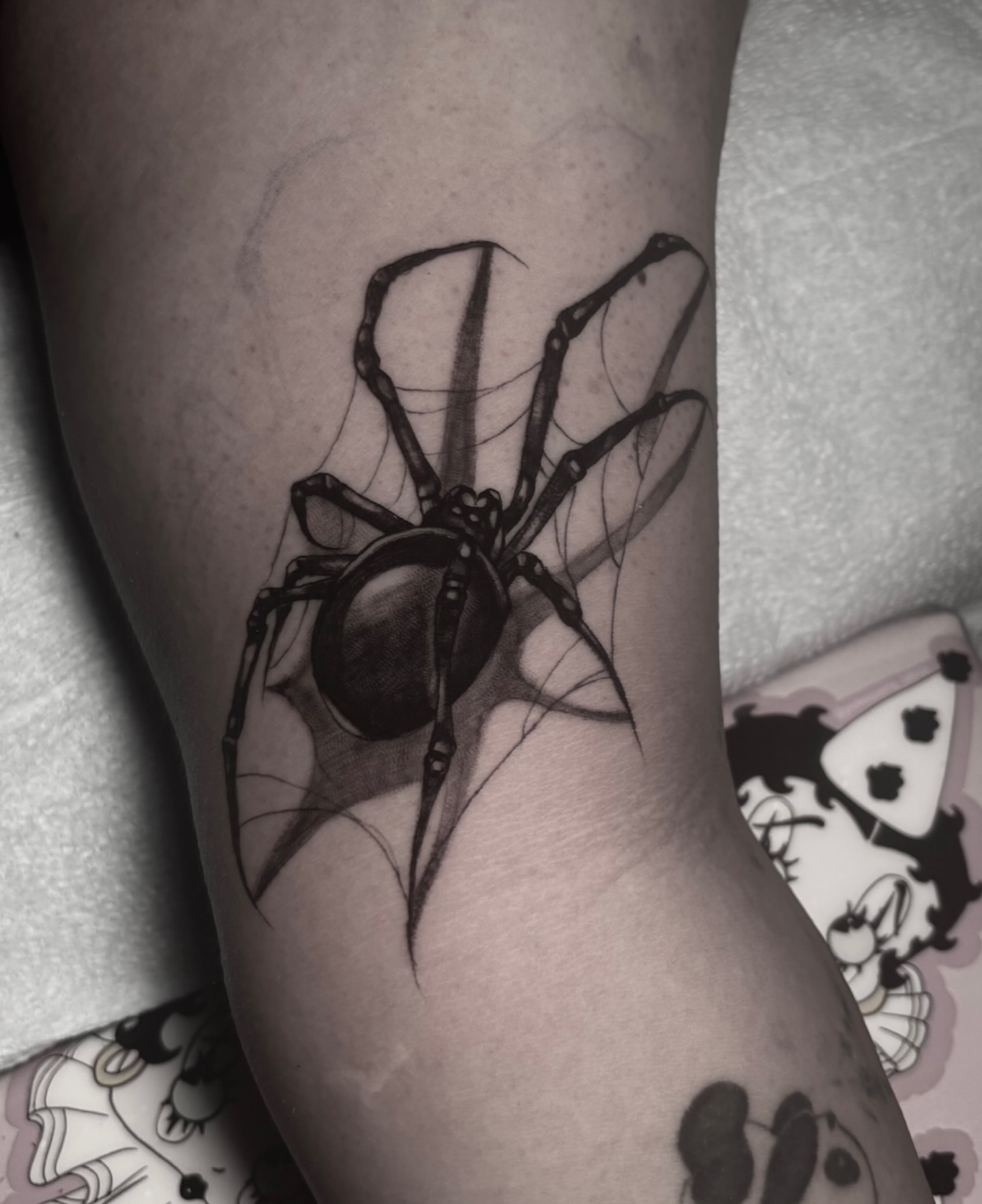 Spider realism tattoo on the forearm by Weho Tattoo Artist Lupe