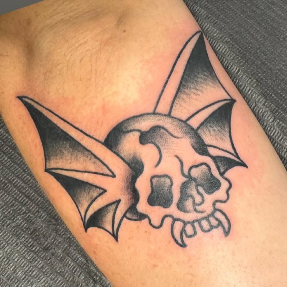 Bat skull dark art tattoo on the forearm by @destineey_barton