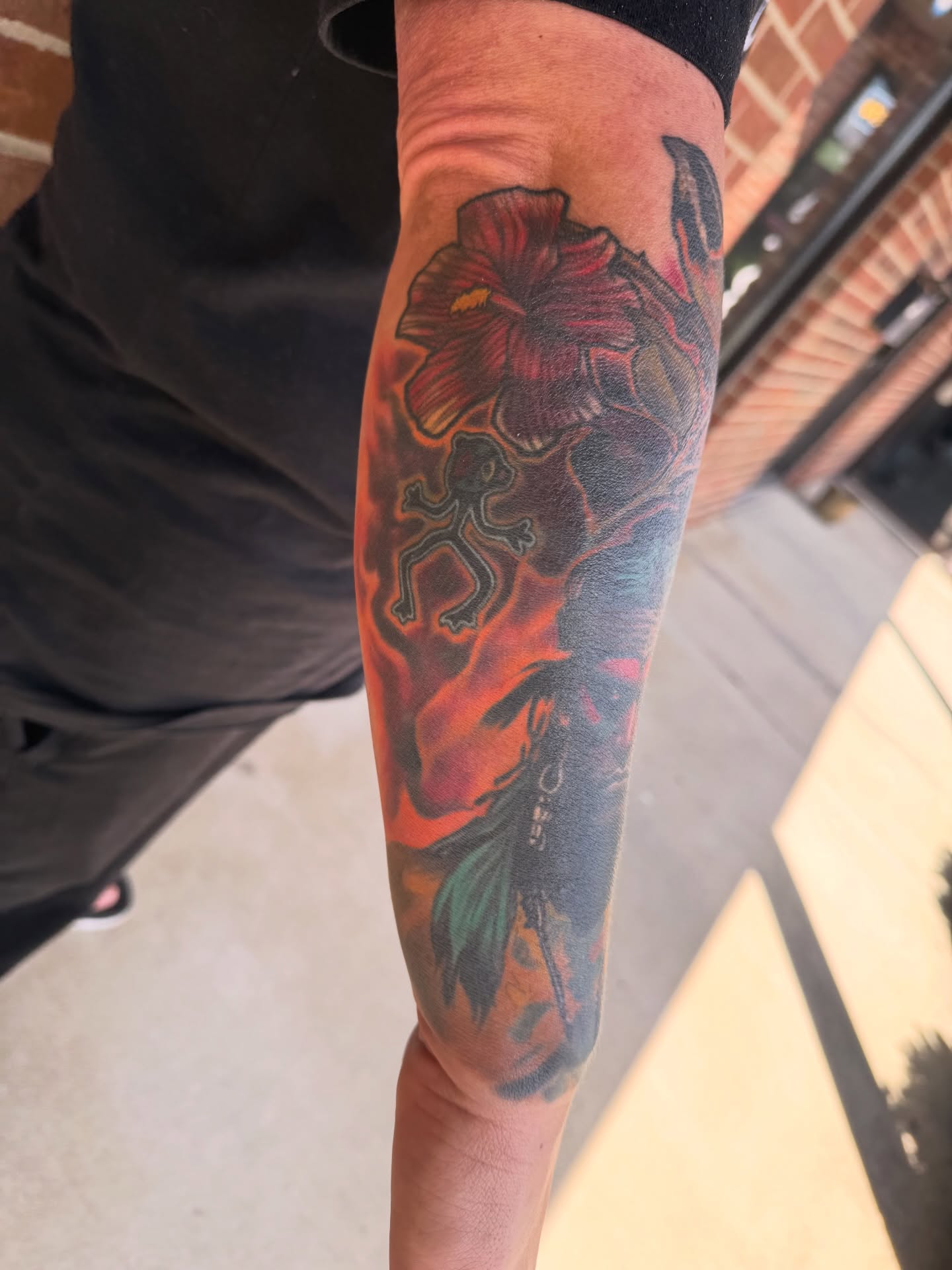 Hibiscus flower realism tattoo on the forearm by Ignacio José Sweeney Rolón Bas Santa Cruz