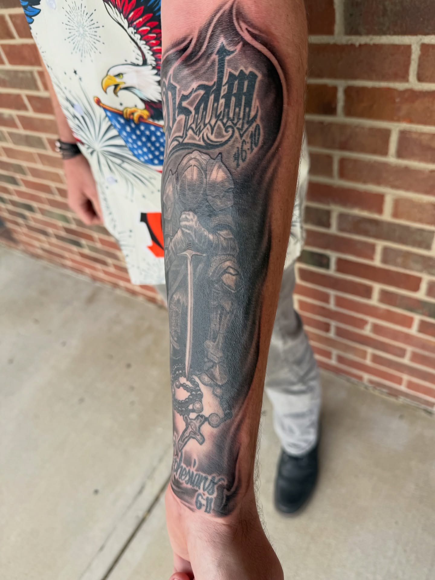 Sword and knight realism tattoo on the forearm by Ignacio José Sweeney Rolón Bas Santa Cruz