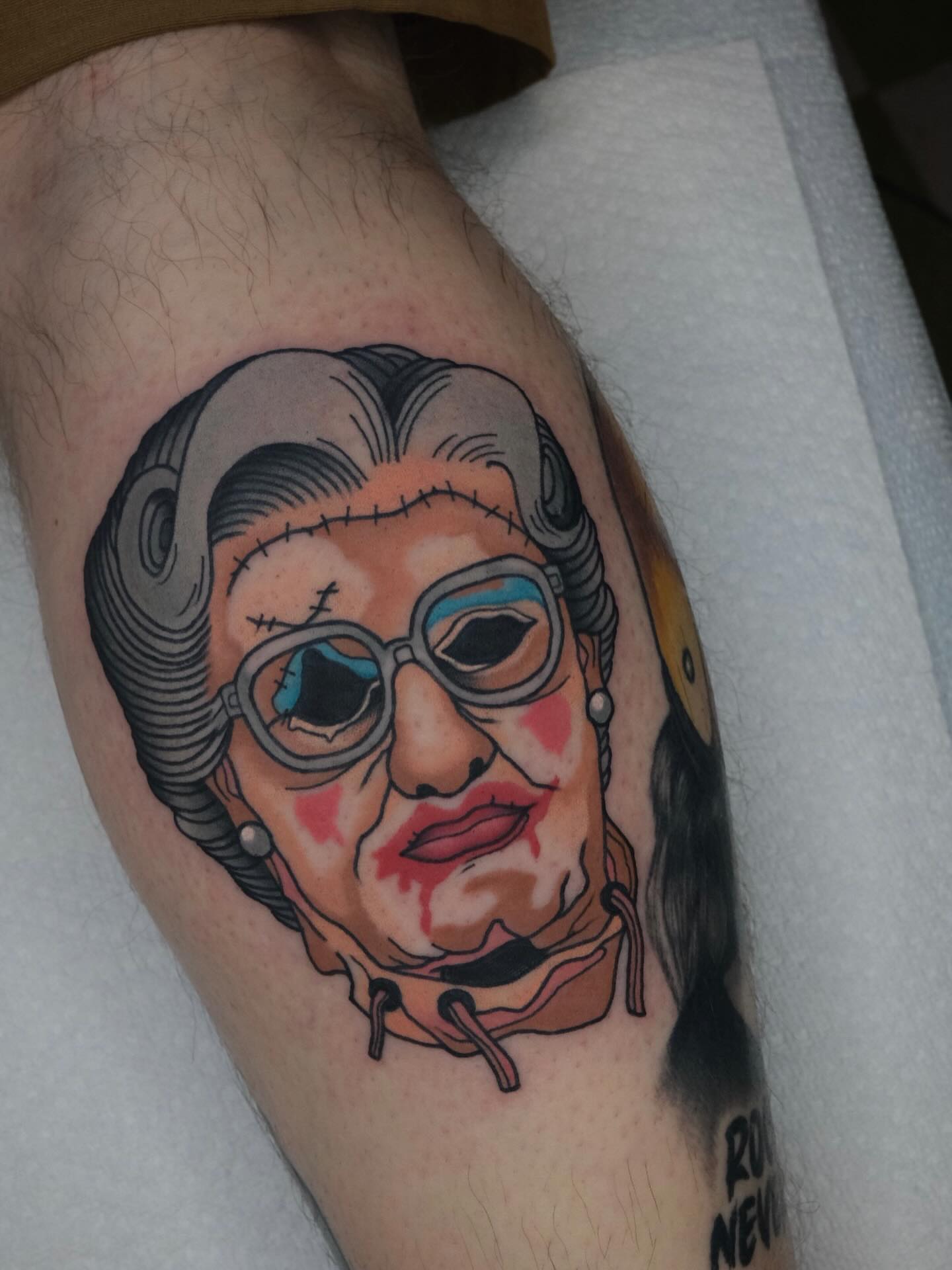 Woman's face American traditional tattoo on the forearm by James Maxwell