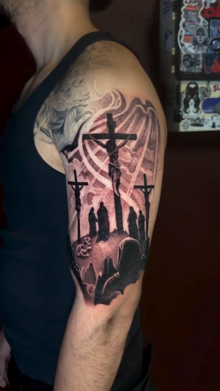 Crucifixion scene realism tattoo by Nick Ochoa