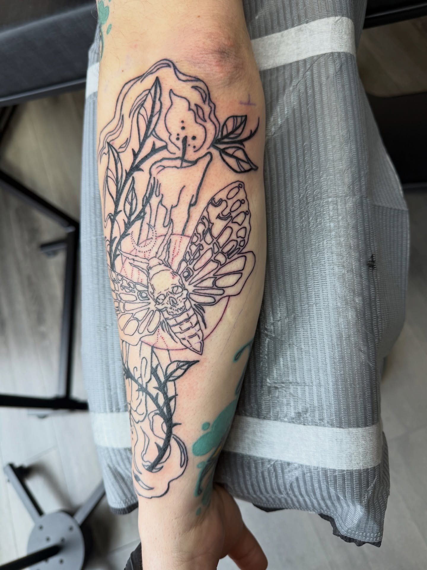 Butterfly and skull geometric tattoo on the forearm by Ignacio José Sweeney Rolón Bas Santa Cruz