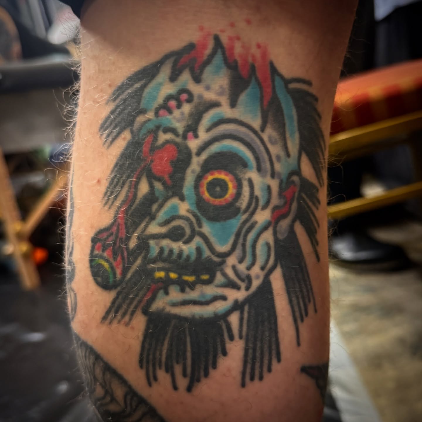 Zombie head American traditional tattoo on the forearm by Chuck Paprocki, Nashville, Tennessee