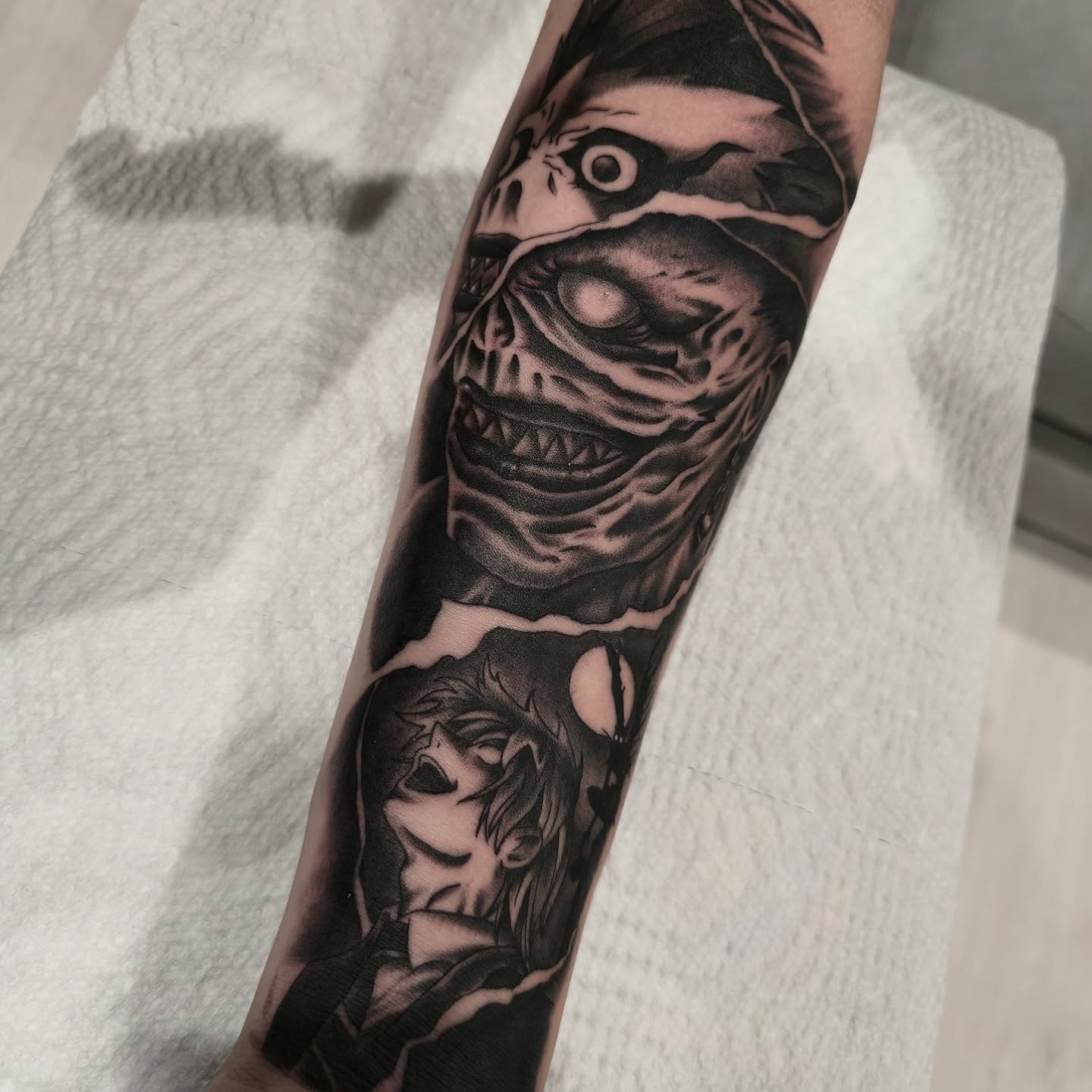 Skull and woman realism tattoo on the forearm by Tattoo Artist, Orange, California