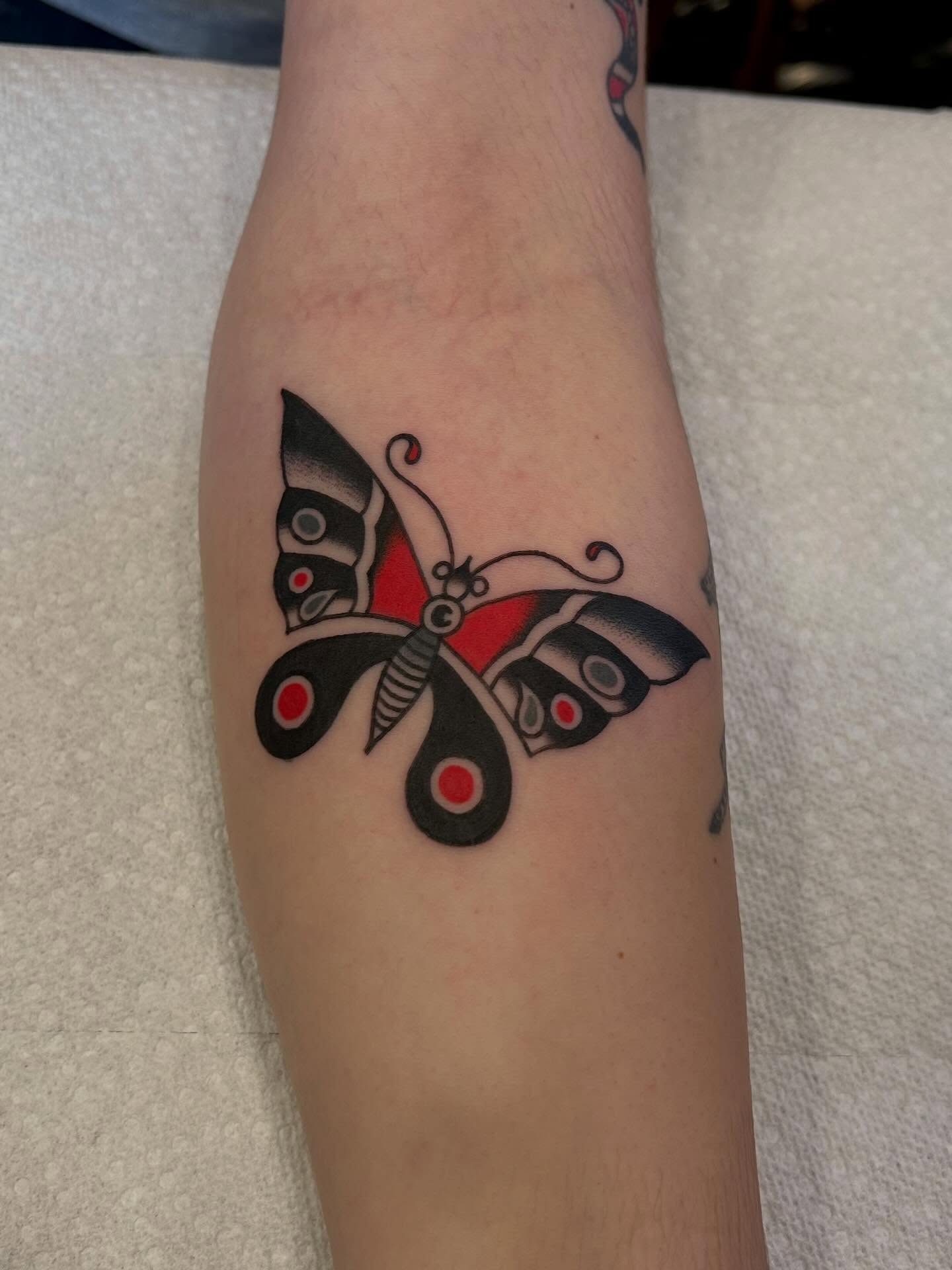 Butterfly dotwork tattoo on the forearm by Christian Lasyone