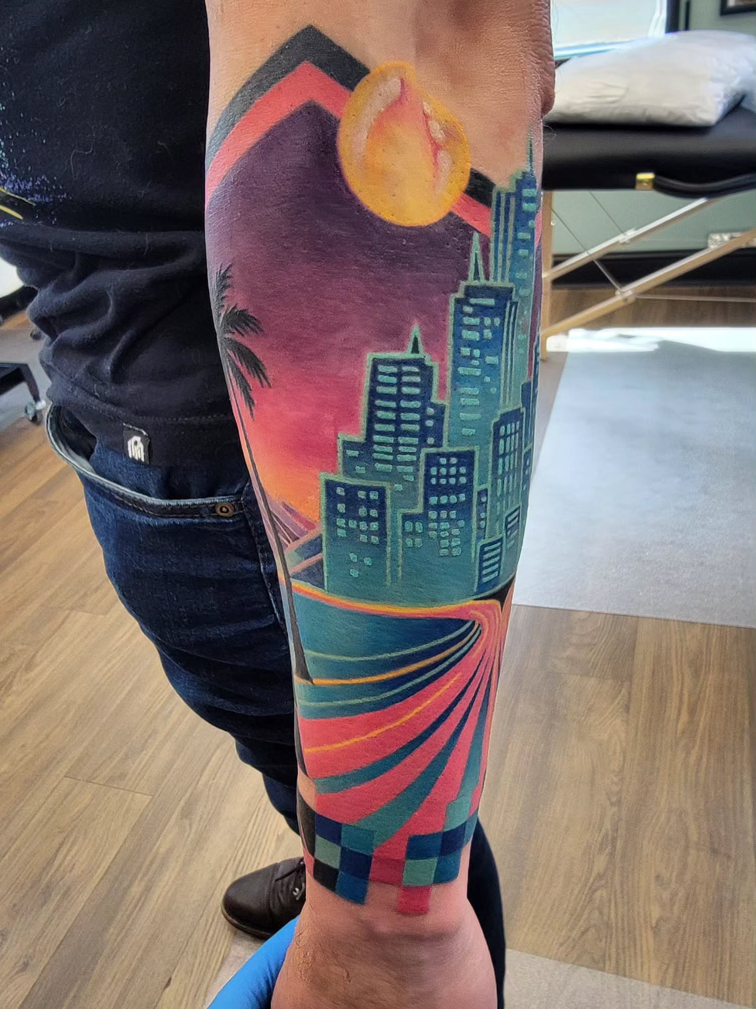 Cityscape geometric tattoo on the forearm by Chantel Chan, Portland, Oregon