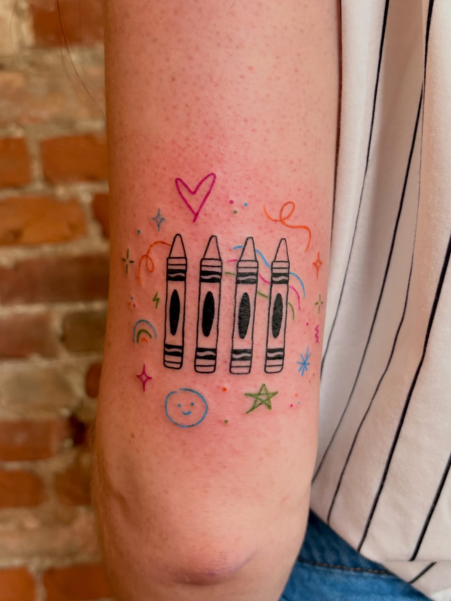 Crayons and confetti illustrative tattoo on the forearm by Jen Osborne ♡ Cincinnati Tattoo Artist