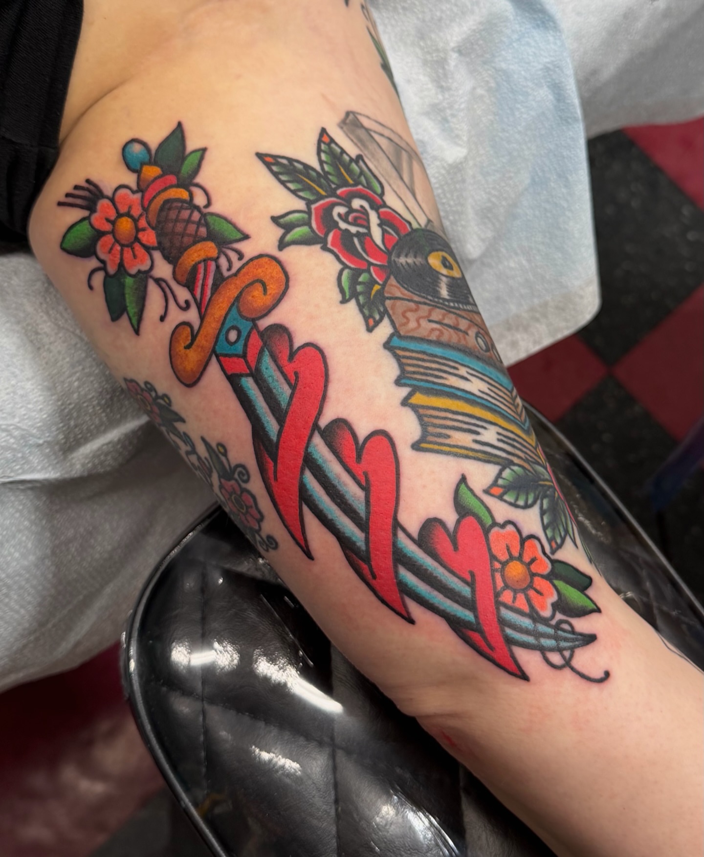 Script lettering American traditional tattoo on the forearm by Patrick Miller, Huber Heights, Ohio