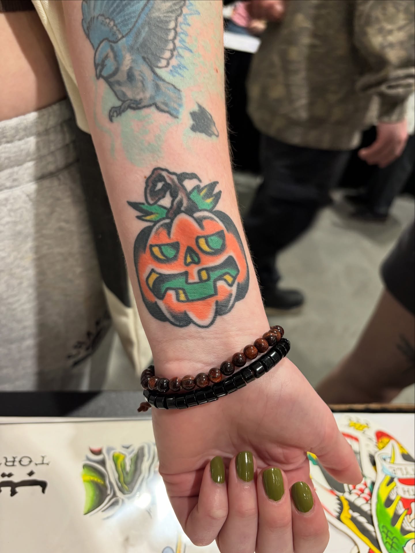 Pumpkin American traditional tattoo on the forearm by Andrew Silva