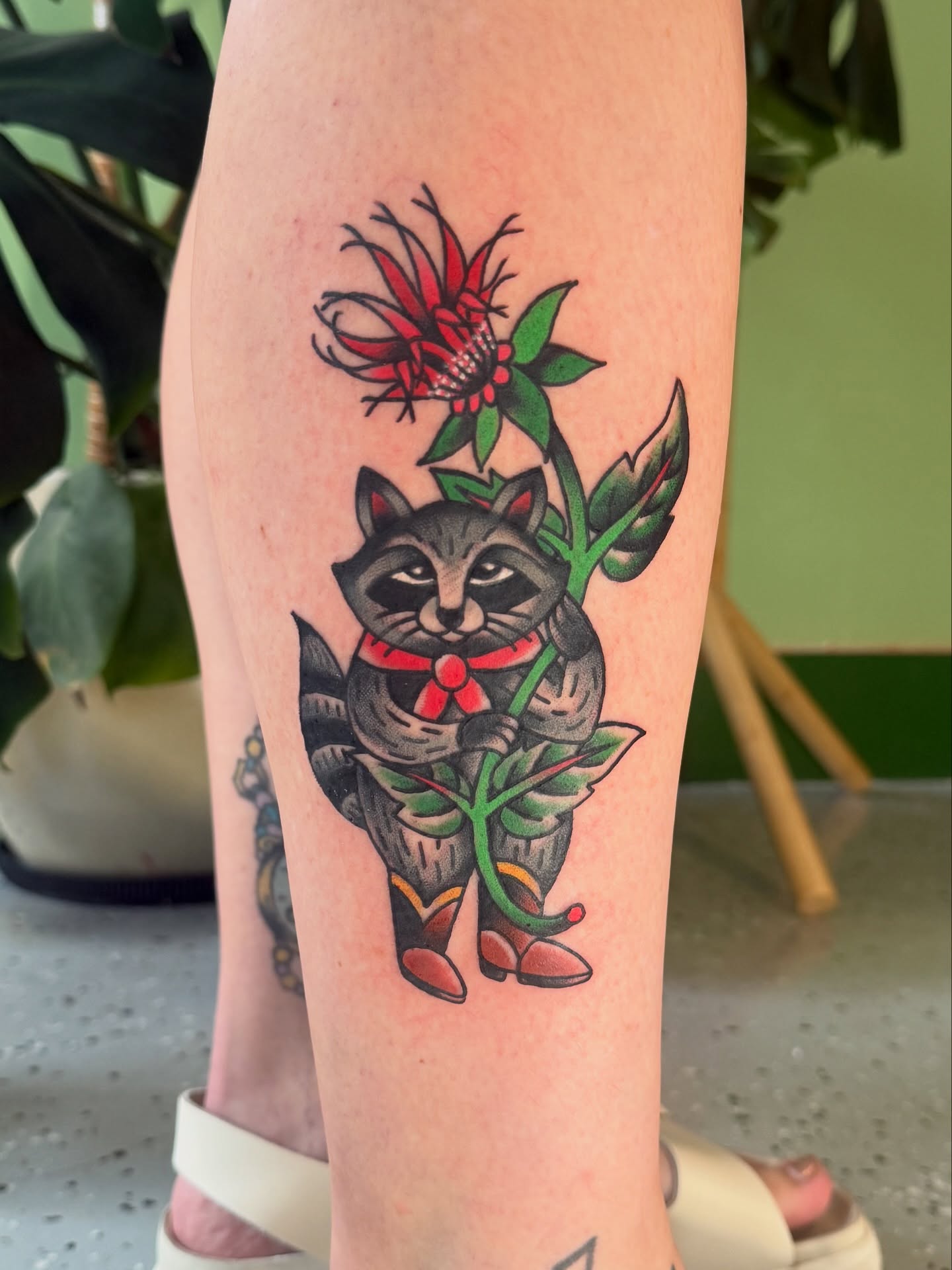 Raccoon and flower American traditional tattoo on the forearm by derrick b. π² Modern Traditional Tattoo
