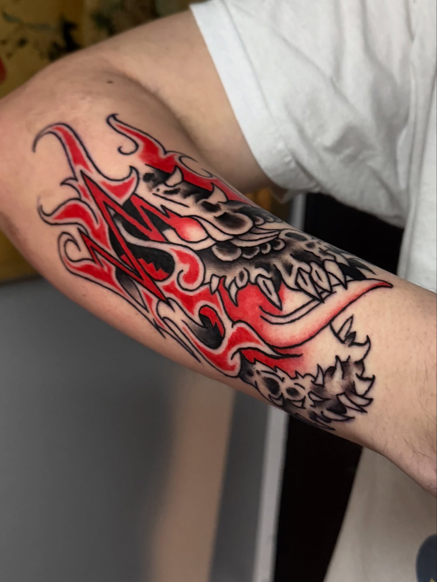 Flame japanese irezumi tattoo on the forearm by Gabe Rosen