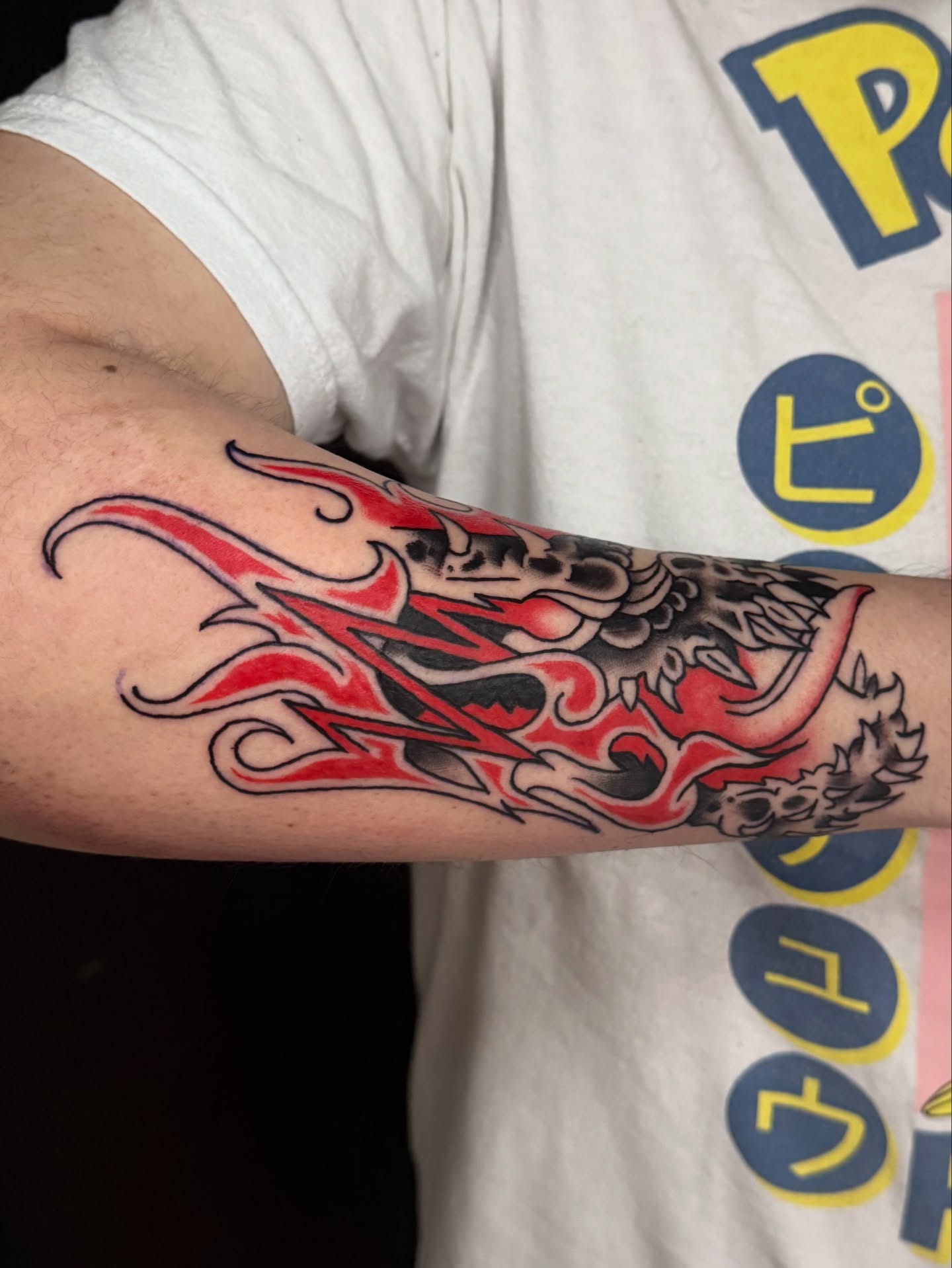Flame dragon japanese irezumi tattoo on the forearm by Gabe Rosen