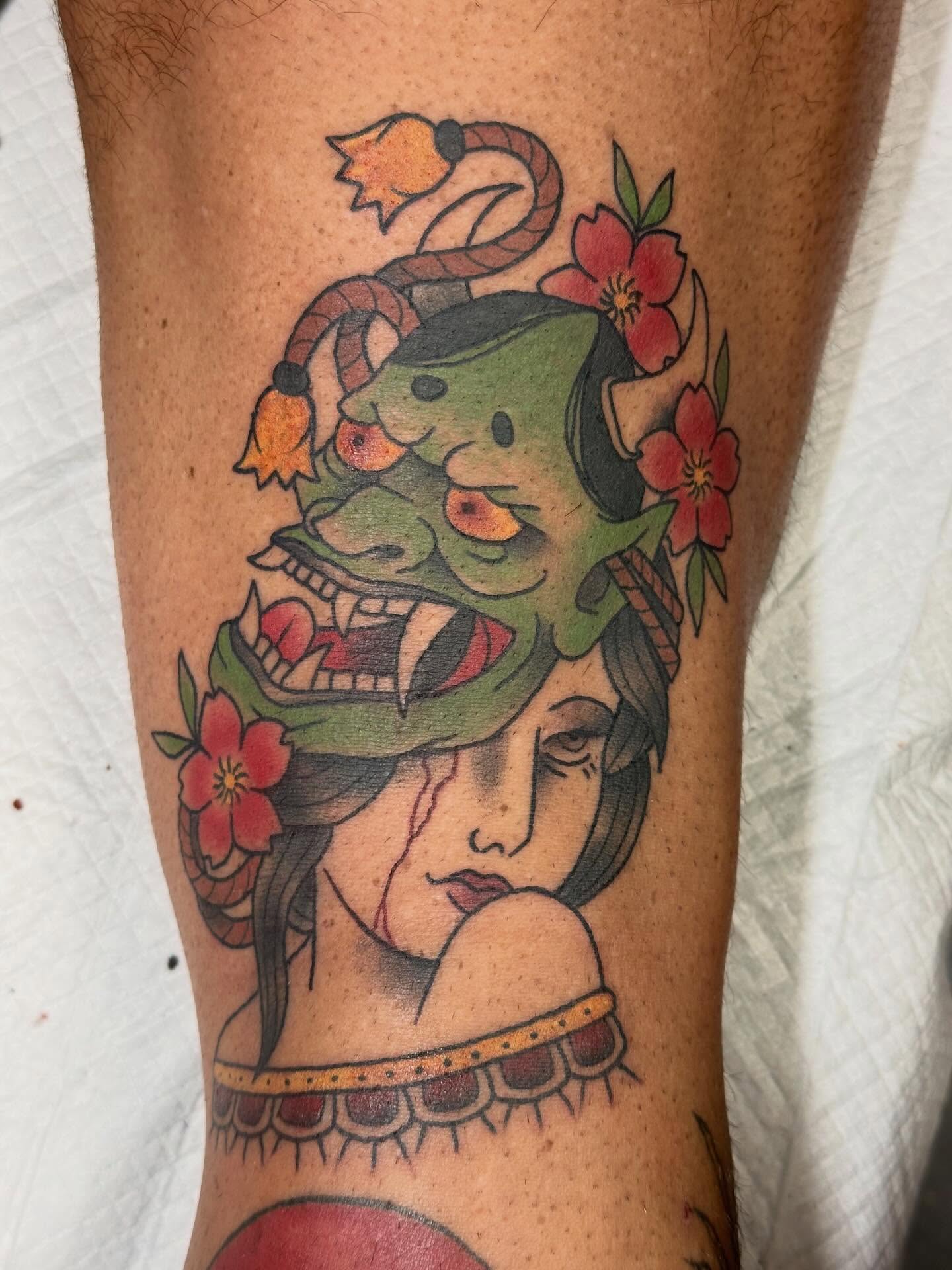 Geisha mask American traditional tattoo on the forearm by Tattoo artist