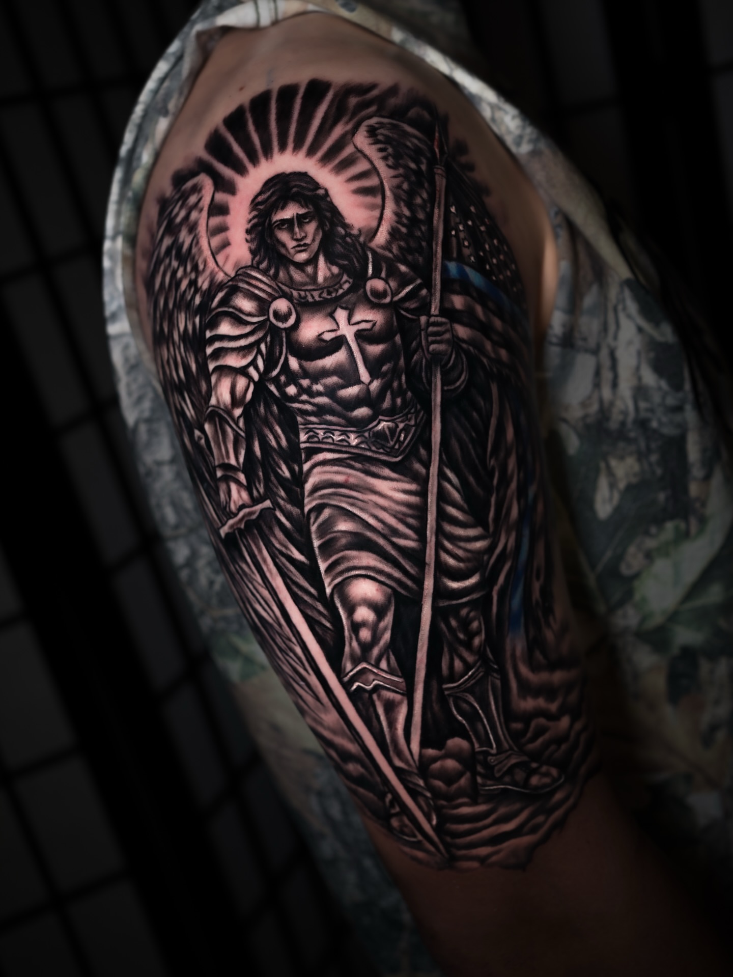 Angel with sword realism tattoo on the forearm by Juan David Arias