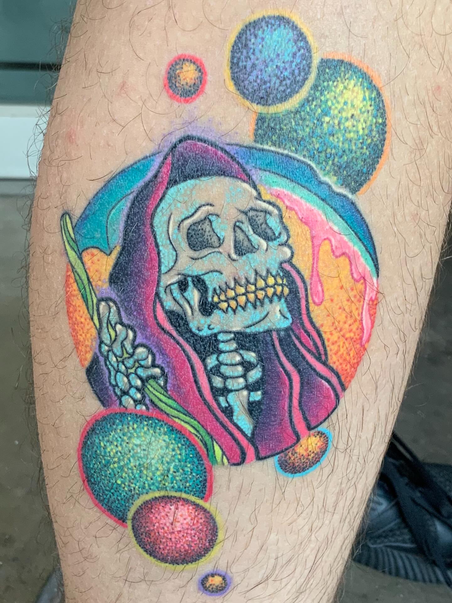 Skull with colorful drapery dotwork tattoo on the thigh by LiteBriteTattoo, Salt Lake City, Utah