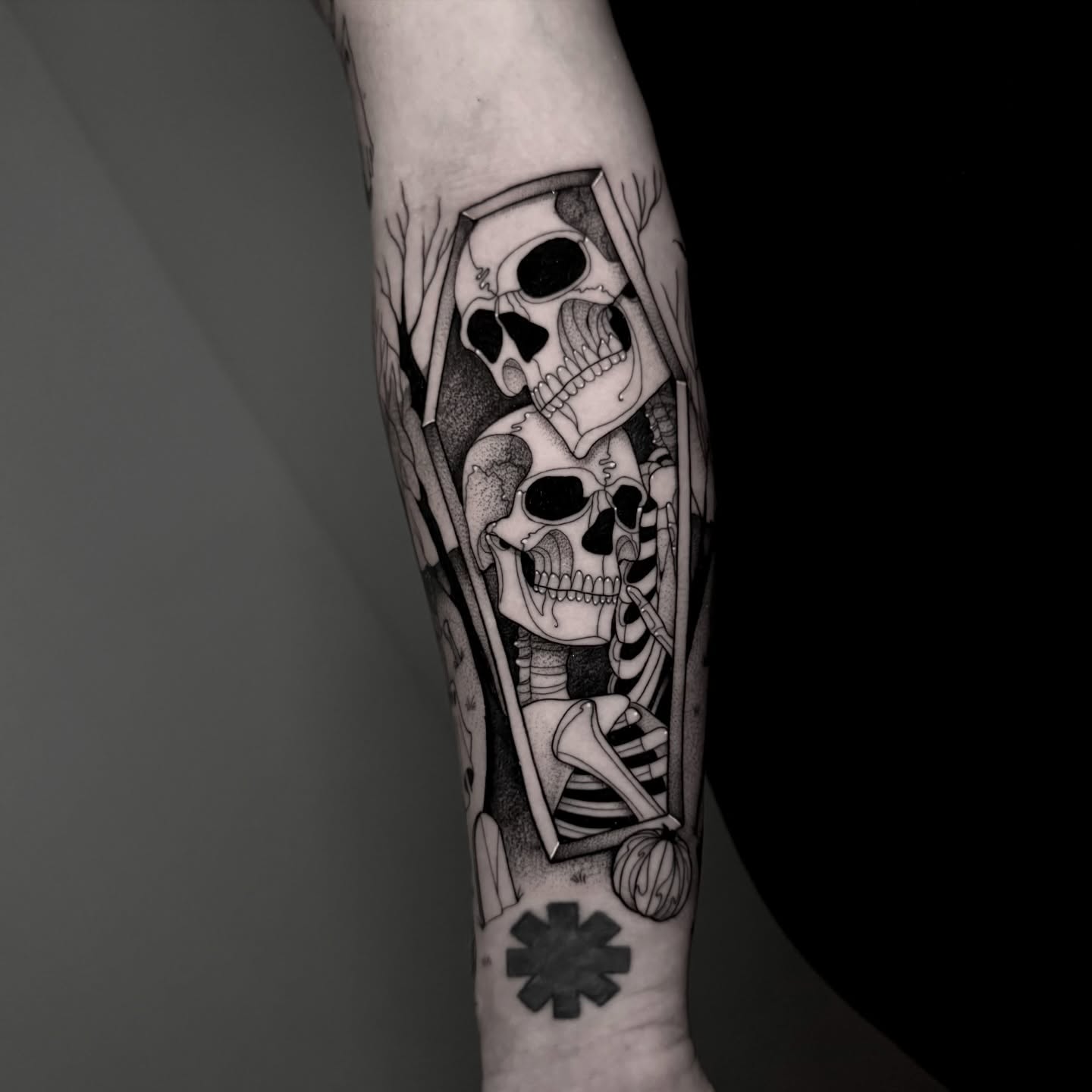 Skeleton in coffin realism tattoo on the forearm by ɪᴠᴏɴɴᴇ