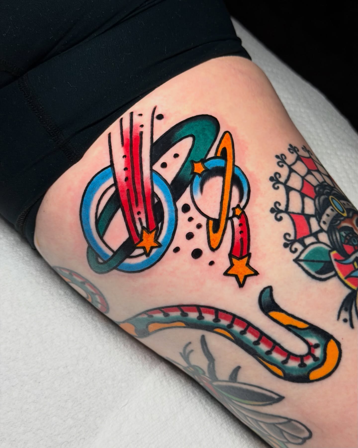 Abstract geometric shapes American traditional tattoo on the thigh by Kyle Dean Traditional Tattoo Artist