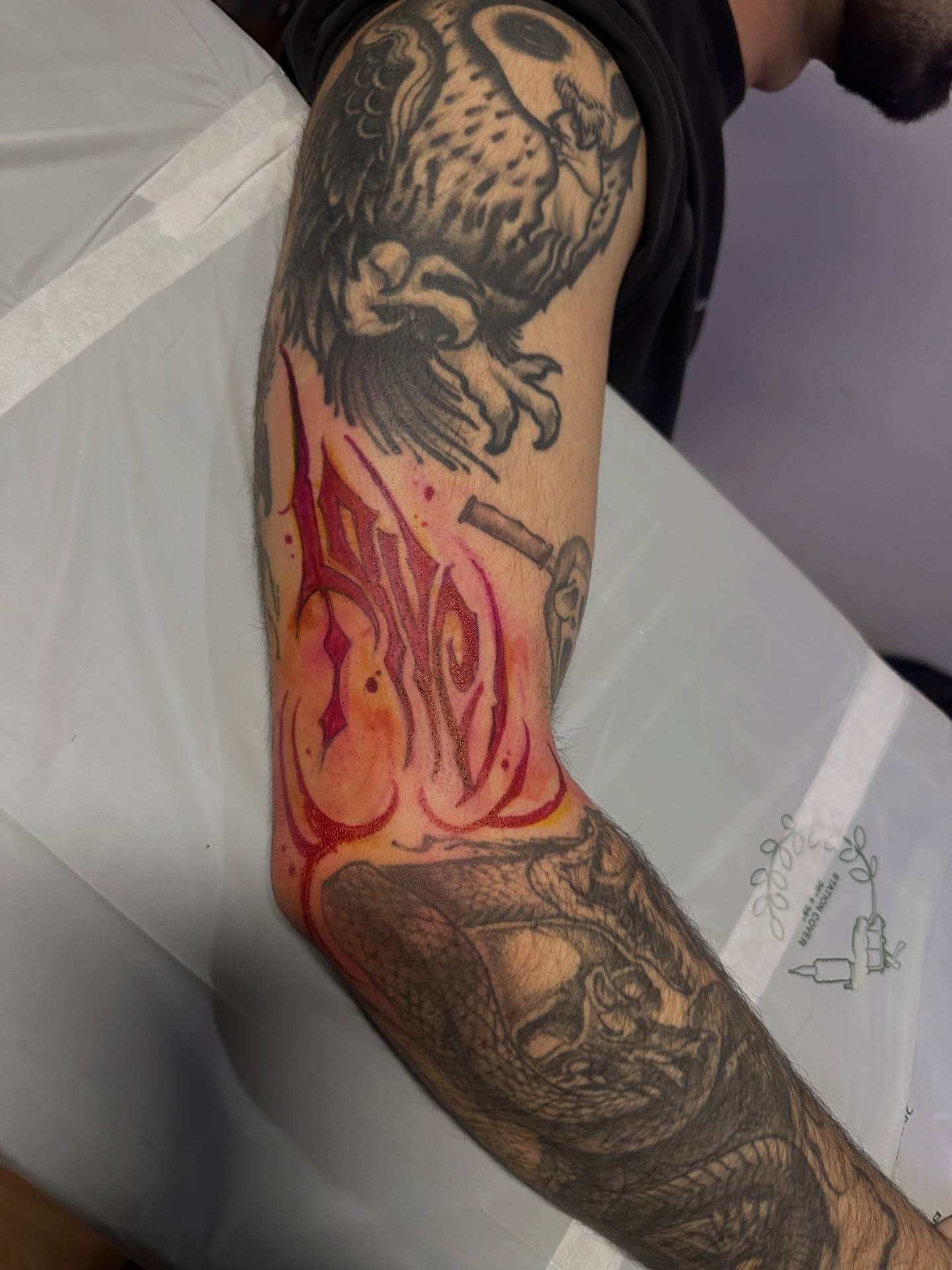 Owl and flame American traditional tattoo on the forearm by Yassin alsaje