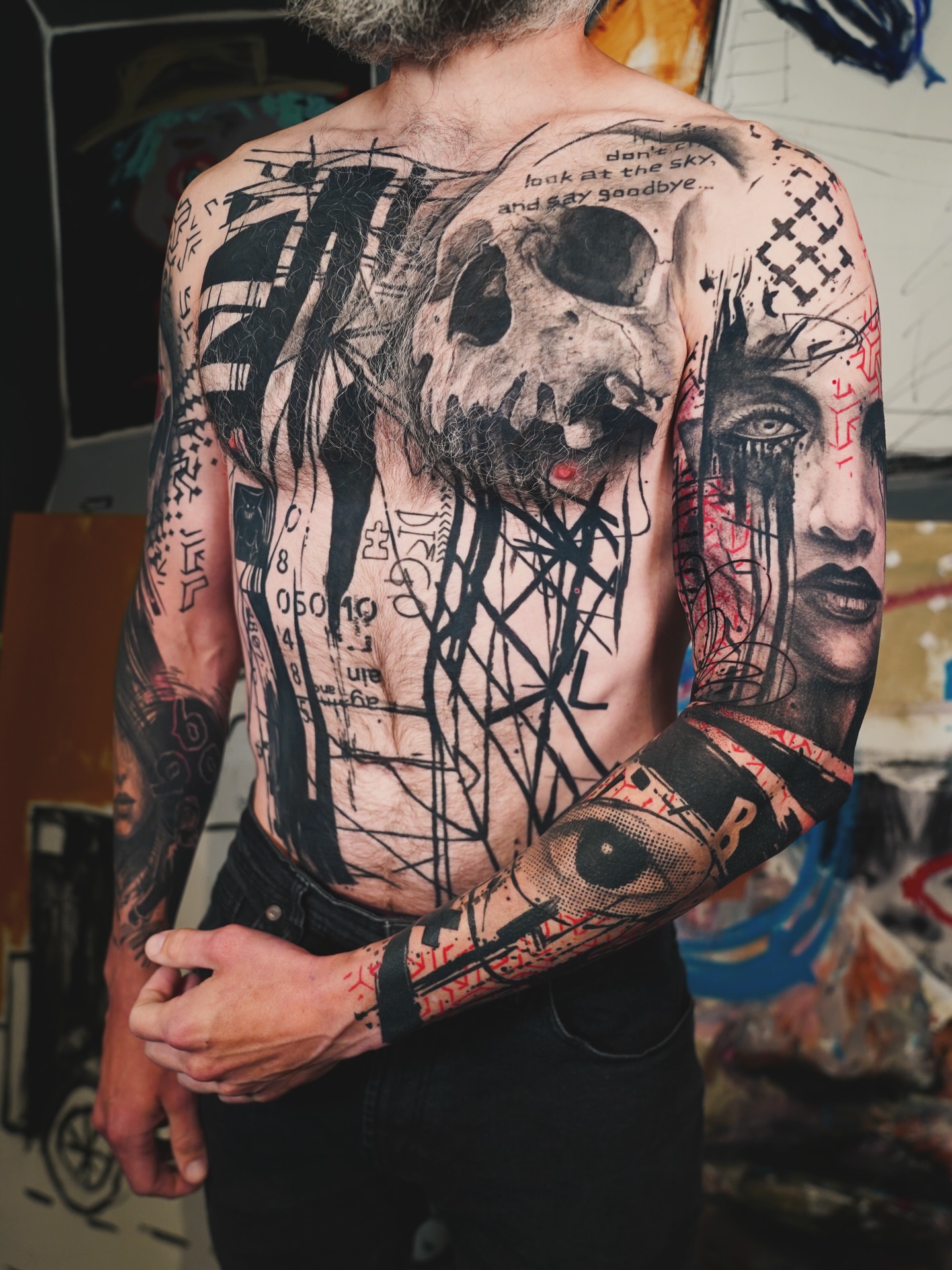 Skull and woman's face dark realism tattoo on the back by Georgios Papadopoulos Tattoo Artist Los