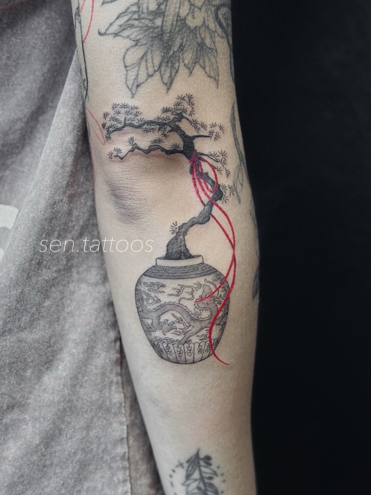 Bonsai tree in pot realism tattoo on the forearm by Sen Tattooer