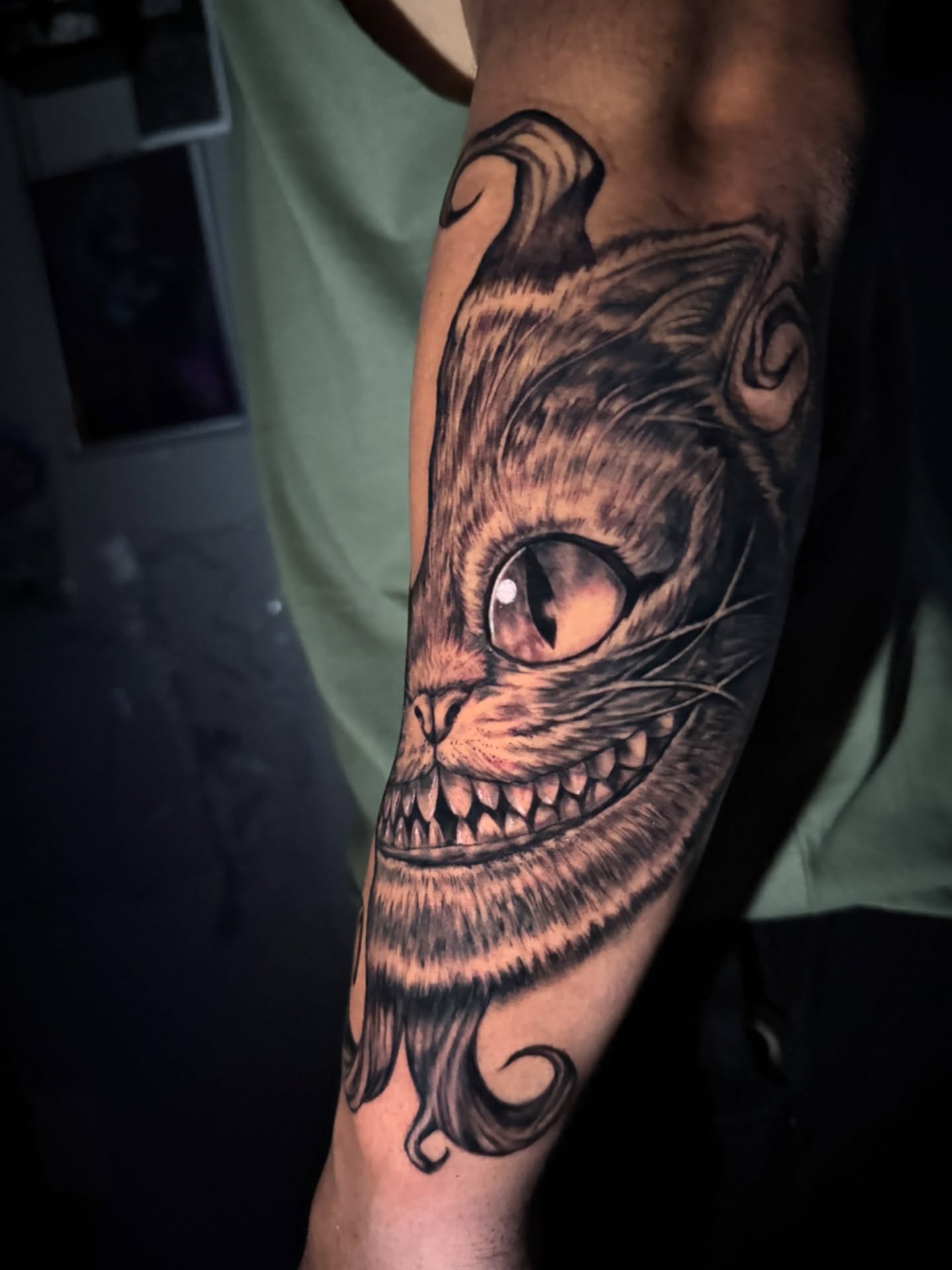 Cheshire cat realism tattoo on the forearm by @mexcellent_tattoos