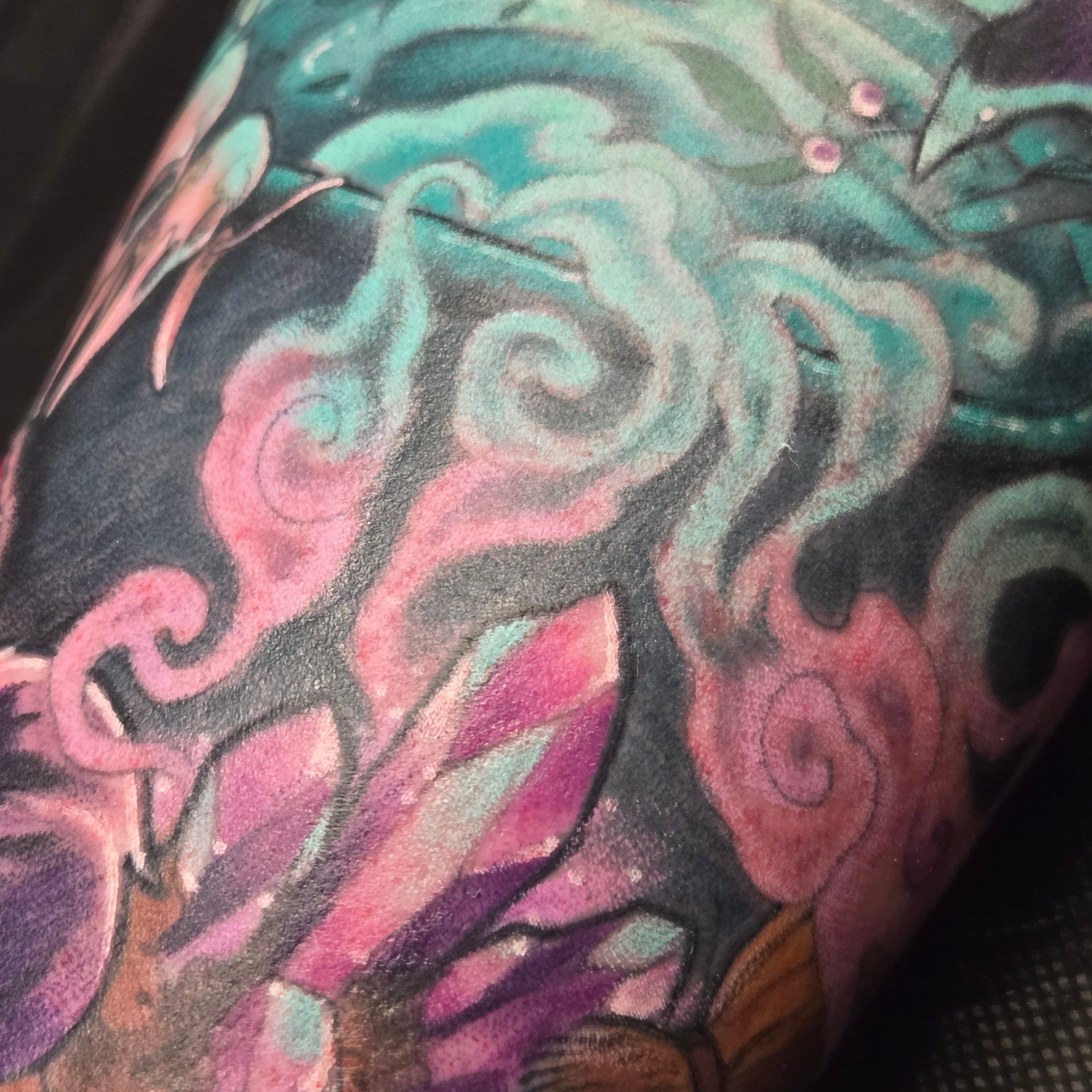 Abstract swirls watercolor tattoo on the upper arm by ◇  Kristyn Kay  ◇ Tattoo Warlock, Des Moines, Iowa