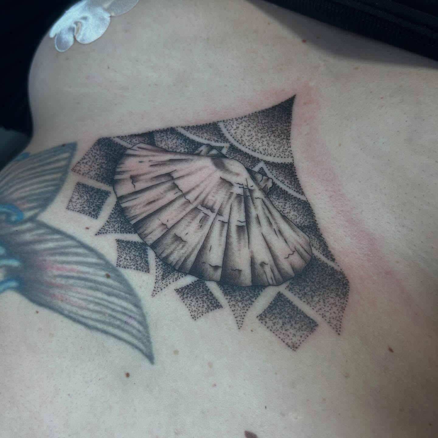 Tattoo by @alexlangtattoo — dotwork