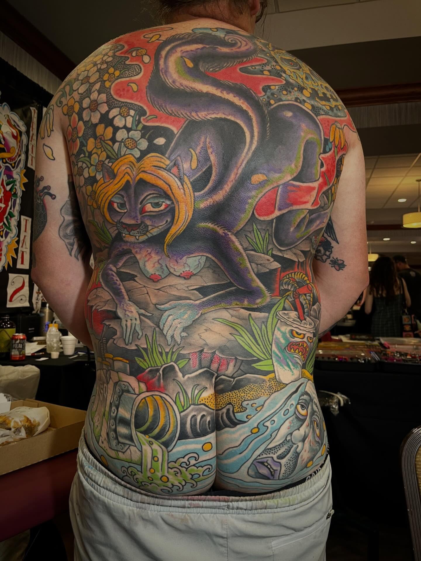 Mythical creature and woman American traditional tattoo on the back by Chris Kline