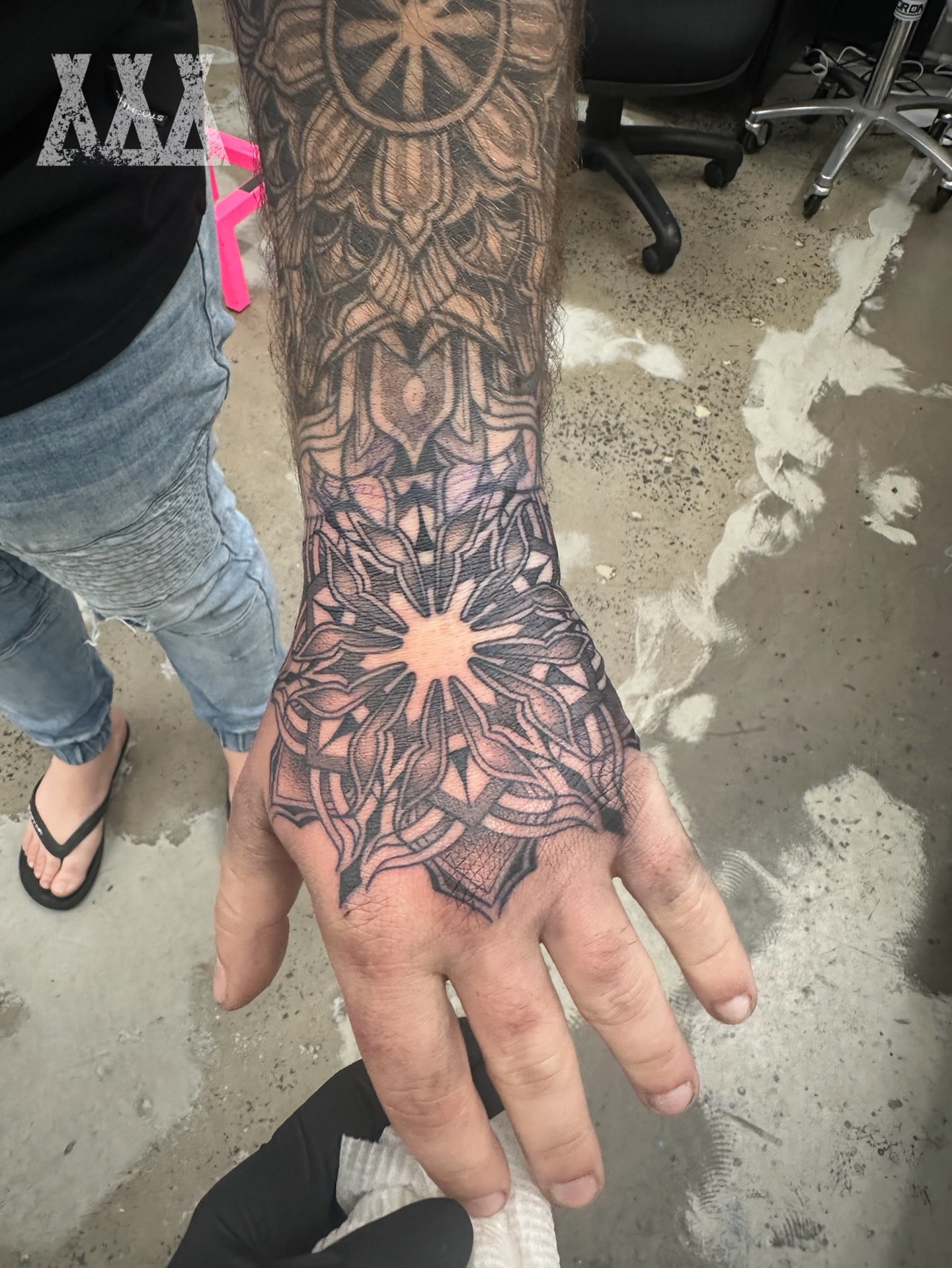 Mandala geometric tattoo on the hand by Lyndsay Southgate