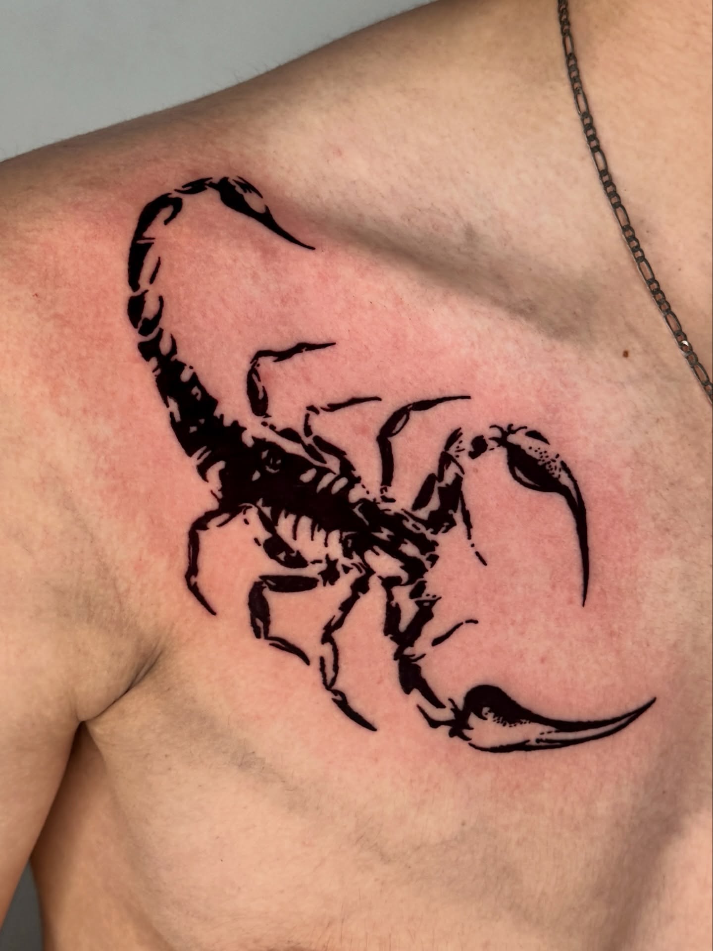 Scorpion black and grey tattoo on the chest by 𝔠𝔲𝔯𝔱𝔦𝔰 ~ tattoo artist