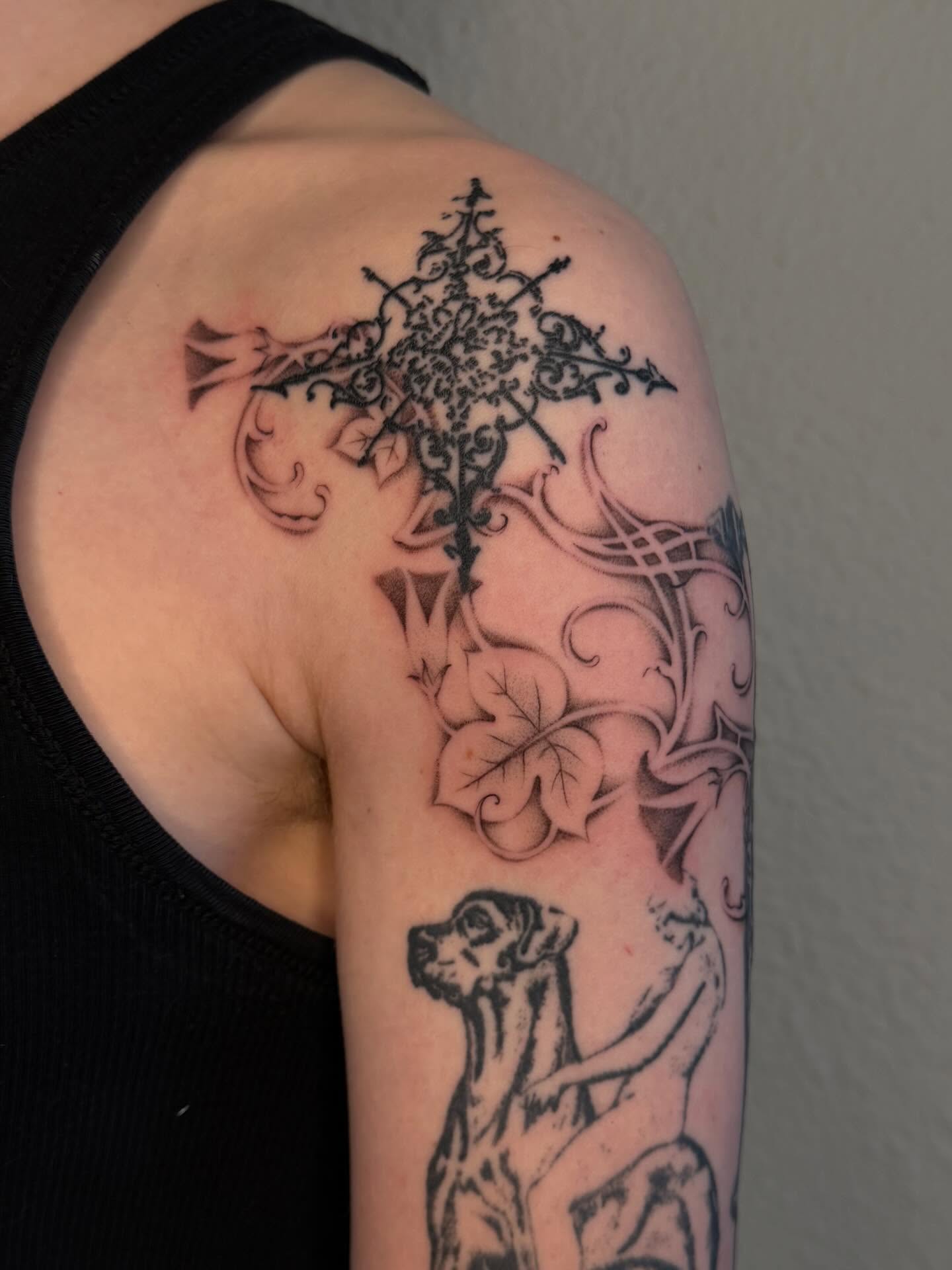 Cross and ivy black and grey tattoo on the shoulder by Nayoung, San Francisco, California