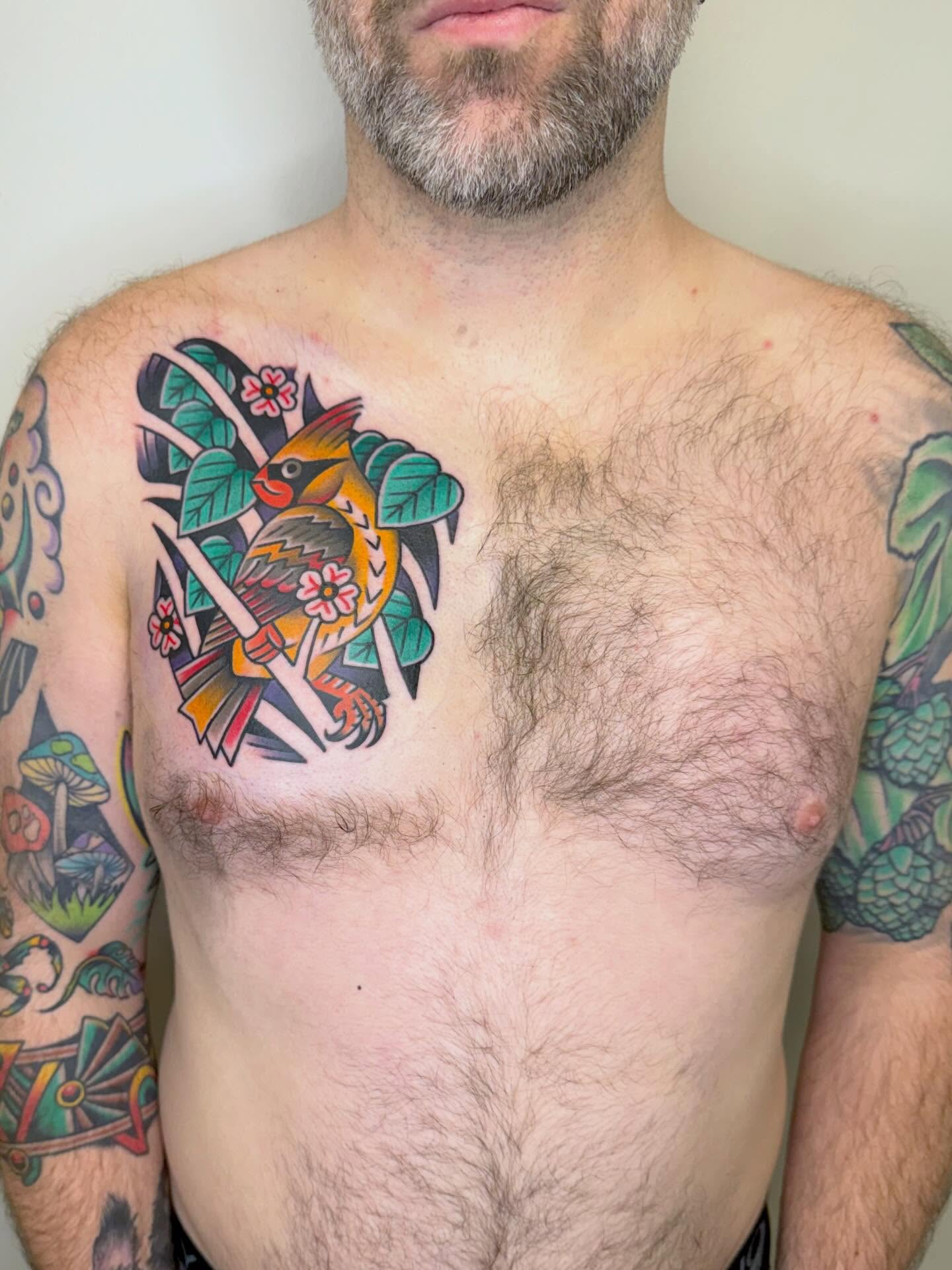 Bird American traditional tattoo on the chest by Matt Paw