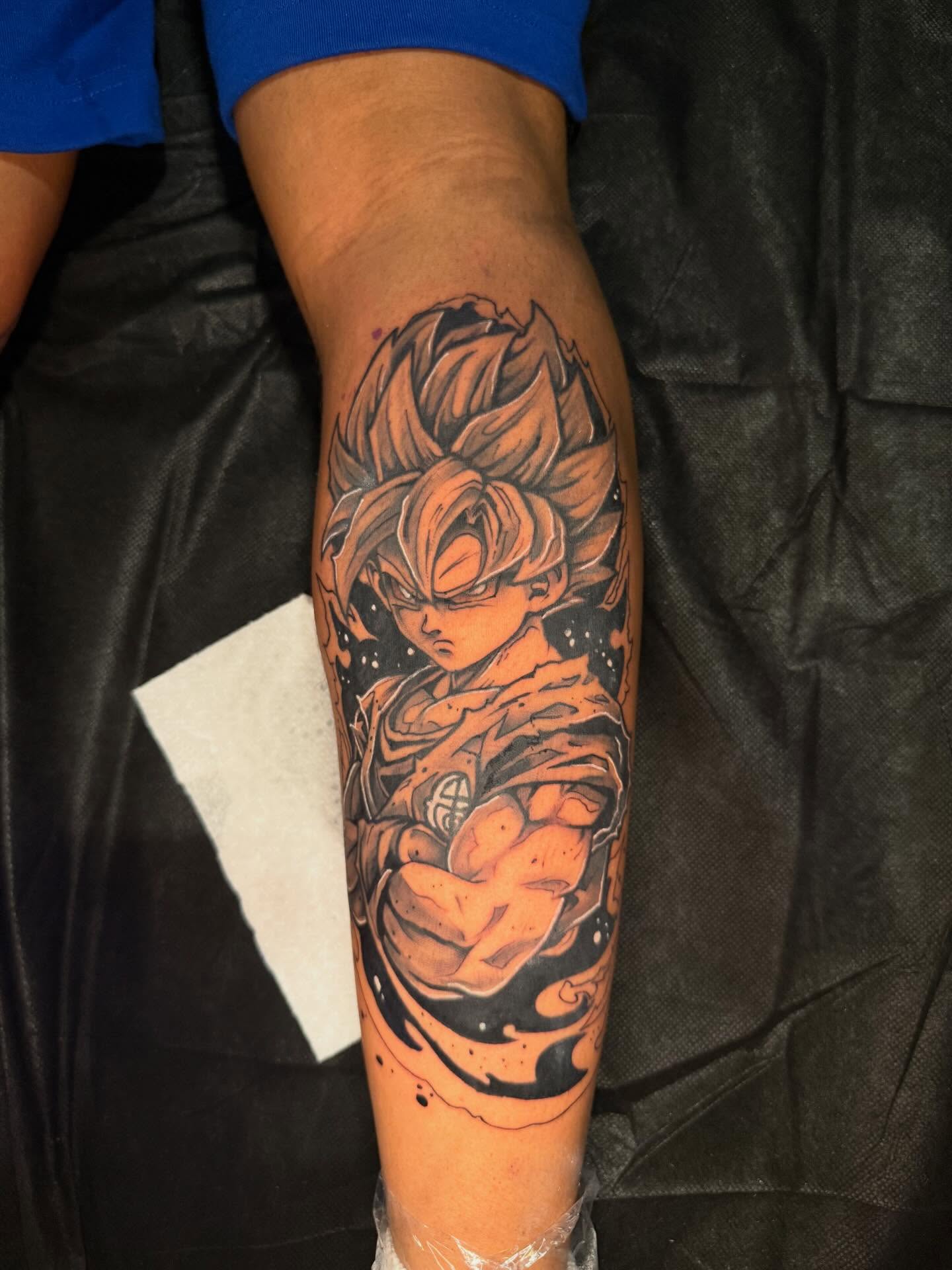 Super saiyan anime tattoo on the forearm by InkdByHendrixx