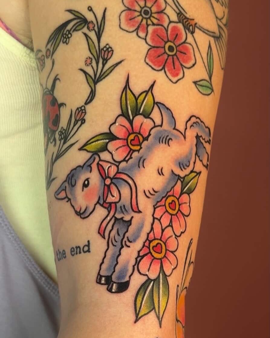 Lamb and flowers American traditional tattoo on the forearm by Car🦋🌈 Dallas Tattoo Artist💖