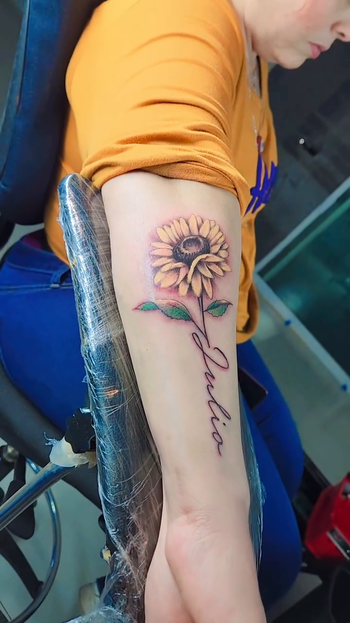 Sunflower with script realism tattoo by Aguascali Firme