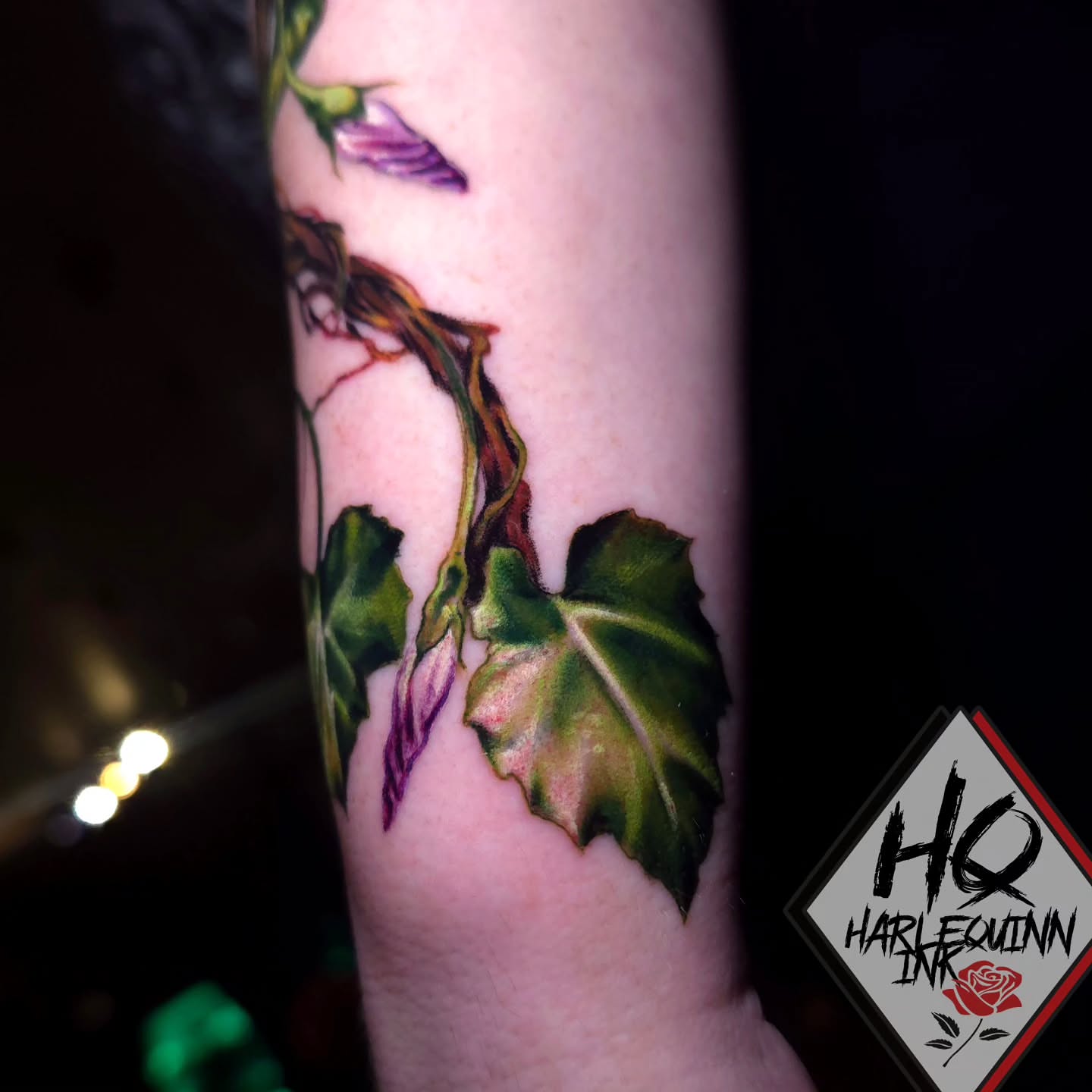 Ivy and purple flower realism tattoo on the forearm by HarleQuinn_Ink