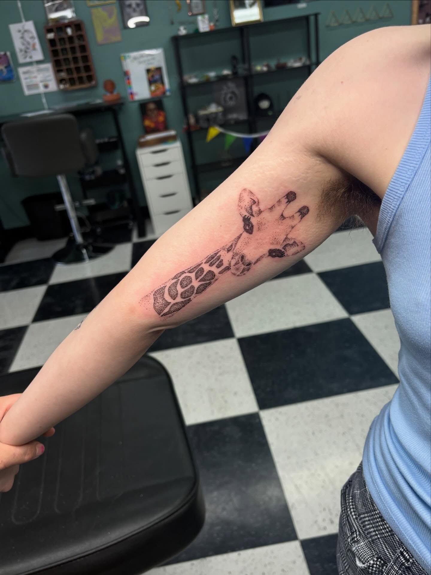 Giraffe paw print dotwork tattoo on the forearm by Joe ⋆₊⋆☢︎⁺₊⚠︎₊⋆