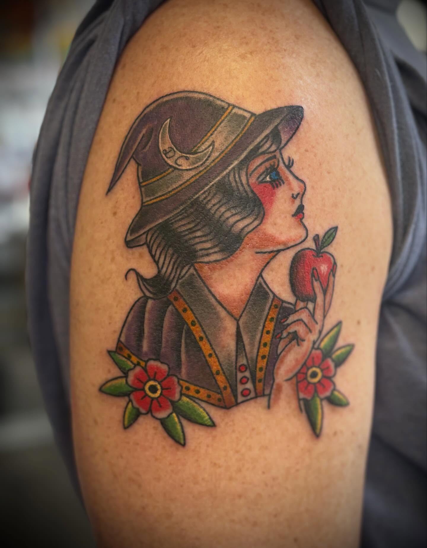 Witch with apple American traditional tattoo on the shoulder by Gardner, Gardner, Massachusetts