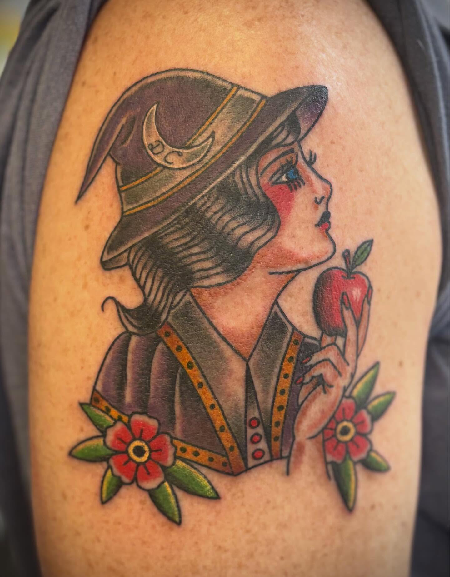 Woman with apple American traditional tattoo on the shoulder by Gardner, Gardner, Massachusetts