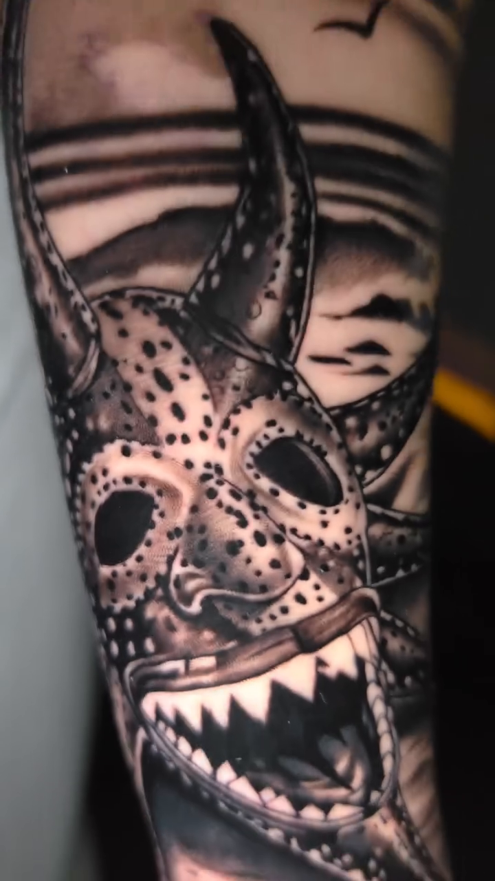 Creature on beach at sunset realism tattoo by Javier M Davila